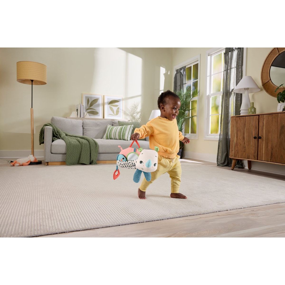 fisher price neushoorn buikspeelgoed 06 kind draagt neushoorn
